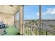 Enclosed balcony offers views of the water, landscaping, and community pool at 3647 Lake Bayshore Dr # 416, Bradenton, FL 34205