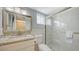 Recently updated bathroom with a walk-in shower, granite countertops, and a vessel sink at 3647 Lake Bayshore Dr # 416, Bradenton, FL 34205