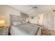Spacious bedroom featuring neutral decor and soft, comfortable bedding at 3647 Lake Bayshore Dr # 416, Bradenton, FL 34205