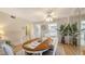 The dining room offers a ceiling fan, hardwood floors and convenient access to the kitchen at 3647 Lake Bayshore Dr # 416, Bradenton, FL 34205