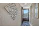 Entryway features decorative wall art, nice tile, and a screen door at 3647 Lake Bayshore Dr # 416, Bradenton, FL 34205