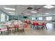 Spacious event space featuring tables with red checkered tablecloths and ample seating arrangements at 3647 Lake Bayshore Dr # 416, Bradenton, FL 34205