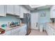Well-lit kitchen features stainless steel appliances, granite countertops, and ample cabinet space at 3647 Lake Bayshore Dr # 416, Bradenton, FL 34205