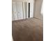 Spacious bedroom features ample closet space and plush carpeting at 3921 Lakeside Rd # 168, Sarasota, FL 34232