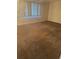 Spacious bedroom with plush carpeting and ample natural light at 3921 Lakeside Rd # 168, Sarasota, FL 34232