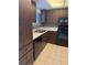 Functional kitchen with stainless steel appliances and ample counter space at 3921 Lakeside Rd # 168, Sarasota, FL 34232