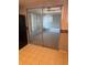 Bright sunroom with sliding glass doors and tile flooring at 3921 Lakeside Rd # 168, Sarasota, FL 34232