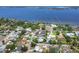 Stunning aerial view of a neighborhood near a lake, highlighting lush greenery and waterfront homes in a great location at 425 46Th Nw St, Bradenton, FL 34209