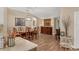 Dining room features a wooden table with chairs and hardwood flooring at 425 46Th Nw St, Bradenton, FL 34209