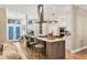 Spacious kitchen featuring a large center island with bar seating and stainless steel appliances at 425 46Th Nw St, Bradenton, FL 34209