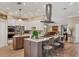 Beautiful kitchen with large island, pendant lighting, stainless steel appliances, and ample counter space at 425 46Th Nw St, Bradenton, FL 34209