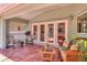 Charming covered patio with comfortable seating, creating a relaxing outdoor living space at 425 46Th Nw St, Bradenton, FL 34209