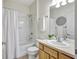 Well-lit bathroom with a shower-tub combination, updated vanity, and ample counter space for daily use at 4740 105Th E Ave, Parrish, FL 34219