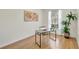 Bright, airy office with a modern desk, chair, window, and decorative plant at 4740 105Th E Ave, Parrish, FL 34219