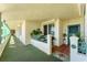 Private balcony with outdoor seating, offering a cozy and inviting space to relax at 4801 Osprey S Dr # 405, St Petersburg, FL 33711