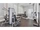 Modern fitness center featuring weight machines, free weights, and ample natural light at 4801 Osprey S Dr # 405, St Petersburg, FL 33711