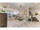 Open-concept living room boasts lots of space and connects to the kitchen and dining areas at 5155 78Th St E Cir, Bradenton, FL 34203