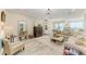 Bright and airy living room featuring hardwood floors and neutral decor at 5155 78Th St E Cir, Bradenton, FL 34203