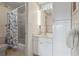 The bathroom has a vanity, ample storage, a shower and tub combo at 5291 Willow Links # 54, Sarasota, FL 34235