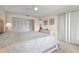 Spacious bedroom with large closet and ample natural light from the window at 5291 Willow Links # 54, Sarasota, FL 34235
