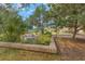 A comfortable seating area in common green space to enhance community and promote relaxation at 5291 Willow Links # 54, Sarasota, FL 34235