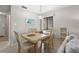 Dining room has seating for four with natural light and neutral paint at 5291 Willow Links # 54, Sarasota, FL 34235