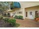 Charming single-story commercial property with a well-maintained landscape and inviting entrance at 5291 Willow Links # 54, Sarasota, FL 34235