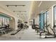 Bright and spacious fitness center with state-of-the-art equipment and large windows at 555 Quay Cmn # 1703, Sarasota, FL 34236