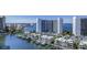 Expansive aerial view of waterfront condos, boat docks, and city skyline at 555 Quay Cmn # 804, Sarasota, FL 34236