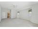 Spacious main bedroom with plush carpeting and ample natural light at 5596 Sabal Trace Dr, North Port, FL 34287