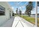 Screened-in patio overlooking the tranquil lake and lush landscaping at 5596 Sabal Trace Dr, North Port, FL 34287