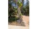 Close-up of the property number and entrance with lush landscaping along a brick pathway at 590 Artists Ave, Englewood, FL 34223