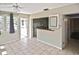Bonus room featuring access to the kitchen and backyard and bright natural lighting at 5905 Olive Ave, Sarasota, FL 34231
