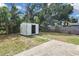 Backyard featuring a storage shed with easy lawn equipment access at 5905 Olive Ave, Sarasota, FL 34231
