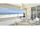 Enjoy breathtaking ocean views from the private balcony perfect for dining or relaxation at 5966 Midnight Pass Rd # G-51 & G-58, Sarasota, FL 34242