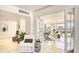 Relaxing living area featuring plush seating, stylish decor, and an open layout with beautiful views at 5966 Midnight Pass Rd # G-51 & G-58, Sarasota, FL 34242