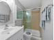 Bright bathroom with glass shower and updated vanity at 6010 36Th Avenue W Cir # E, Bradenton, FL 34209