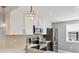 Bright kitchen featuring stainless appliances, updated lighting, and white countertops at 6010 36Th Avenue W Cir # E, Bradenton, FL 34209