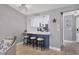 Beautiful kitchen featuring a breakfast bar, updated countertops, and stainless steel appliances at 6010 36Th Avenue W Cir # E, Bradenton, FL 34209