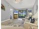 Well-decorated living room with sliding doors to the outside and ample natural light at 6010 36Th Avenue W Cir # E, Bradenton, FL 34209