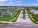 Aerial view of a Primary planned community featuring water features, lakes, and lush landscaping at 6244 Talon Preserve Dr, Nokomis, FL 34275