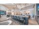 Modern bar area with sleek countertops and seating, ideal for relaxing and socializing with neighbors at 6244 Talon Preserve Dr, Nokomis, FL 34275