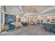 Inviting clubhouse interior with comfortable seating, stylish decor, and a bar area at 6244 Talon Preserve Dr, Nokomis, FL 34275