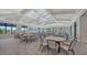 Bright dining area with large windows, offering scenic views and ample natural light for community meals at 6244 Talon Preserve Dr, Nokomis, FL 34275