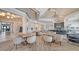 Elegant dining area with stylish tables and chairs, perfect for social gatherings and community events at 6244 Talon Preserve Dr, Nokomis, FL 34275