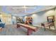 Entertaining game room with a variety of arcade games, providing a fun and engaging space for community members at 6244 Talon Preserve Dr, Nokomis, FL 34275