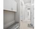 Well-organized mudroom with built-in bench and storage, offering a practical entryway at 6244 Talon Preserve Dr, Nokomis, FL 34275