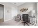 Inviting office with ample natural light, decorative art, and comfortable seating at 6244 Talon Preserve Dr, Nokomis, FL 34275