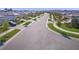 Street view of a planned community with sidewalks, landscaping, and matching homes at 6244 Talon Preserve Dr, Nokomis, FL 34275