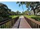 Scenice view from the bridge over the canal with the building in the background at 6285 Midnight Pass Dr # 403, Sarasota, FL 34242